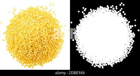 Pile of polished proso millet (Panicum miliaceum seeds), isolated, top view Stock Photo