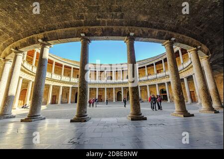 Granada, Spain - January 7, 2020: View of enclosed circular courtyard at the Palace of Charles V, a renaissance palace, at Alhambra complex.