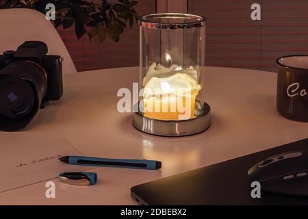 Ambient Glass Wind Light on a desk Stock Photo
