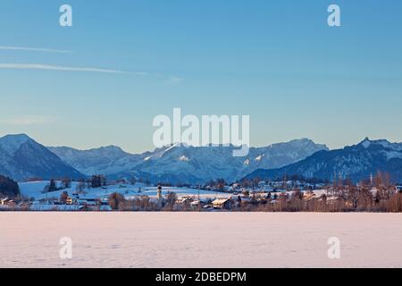 geography / travel, Germany, Bavaria, view across frozen Riegsee towards Froschhausen with Wetterstein, Additional-Rights-Clearance-Info-Not-Available Stock Photo