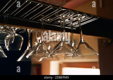 Empty transparent wine glasses in cafe. Close up Stock Photo