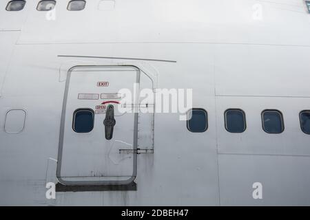 Emergency door exit on the plane Stock Photo