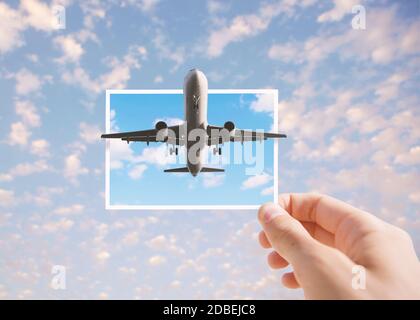 Airplane flying out the instant photo. Toned image. Stock Photo