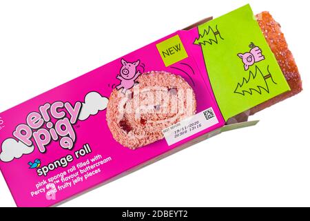M&S Percy Pig sponge roll cake in box set on white background - pink sponge roll filled with Percy Pig flavour buttercream and fluffy jelly pieces Stock Photo