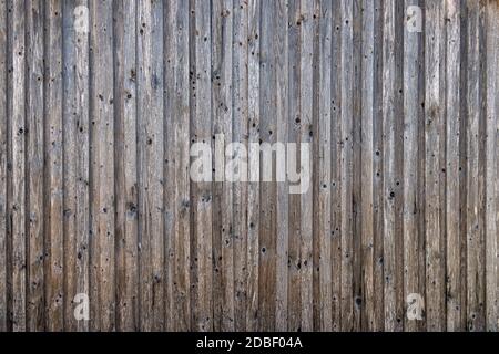 Rustic old wooden wall of a barn Stock Photo