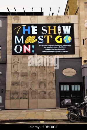 London, UK. 16th Nov, 2020. The Show Must Go On sign in support of the theatre industry is seen outside London Palladium.Most places have closed as the second month-long national lockdown takes hold in England. Credit: SOPA Images Limited/Alamy Live News Stock Photo