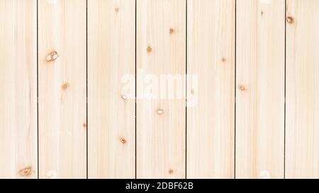 panoramic wooden background - unpainted wood board from vertical narrow pine planks Stock Photo