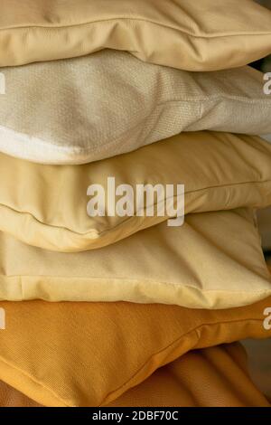 Beige decorative pillows made from real leather Stock Photo