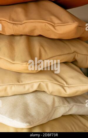 Ochre decorative pillows made from real leather Stock Photo