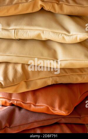 Various decorative pillows made from real leather Stock Photo