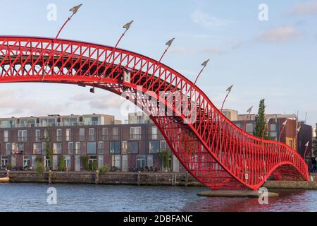 Red Pyton Bridge Landmark in Amsterdam Netherlands Stock Photo