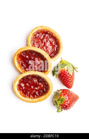 Sweet biscuits with strawberries jam and strawberries isolated on white background. Stock Photo