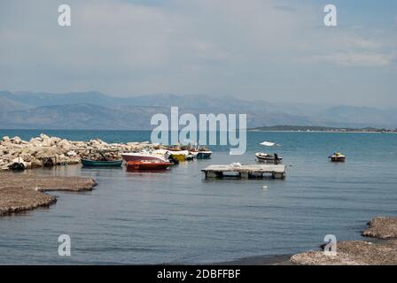 beautiful  landscape motor boat in Roda beach coast of Corfu Stock Photo