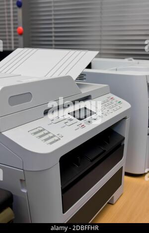 Grey computer printer document in office equipment Stock Photo