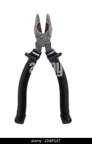Pliers isolated. Close-up of an open rusty well used metal combination pliers with black handles isolated on a white background. Macro photograph. Stock Photo