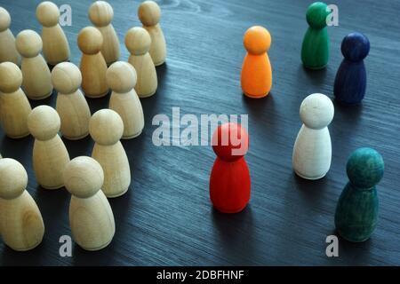 Diversity and Inclusion concept. Wooden and colored figurines. Stock Photo