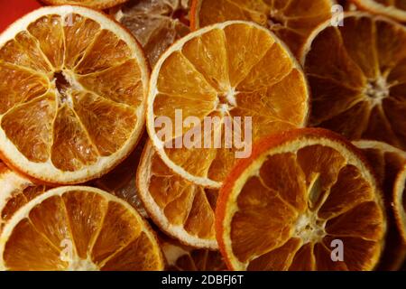 Lots of dried orange slices on top of eachother Stock Photo