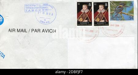 GOMEL, BELARUS - AUGUST 31, 2020: Old envelope which was dispatched from Solomon Islands to Gomel, Belarus, August 31, 2020. Stock Photo