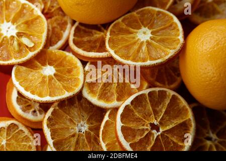 Lots of dried orange slices on top of eachother Stock Photo