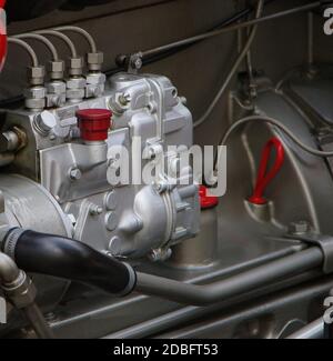 Silvery engine block in red tractor classic car Stock Photo