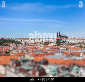 View of Stare Mesto Old City and St. Vitus Cathedral from Town Hall with tilt shift toy effect shallow depth of field. Prague, Czech Republic Stock Photo