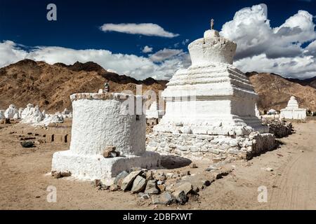 White chortens (stupas) near Shey, Ladakh, Jammu and Kashmir, India Stock Photo