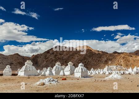 Whitewashed chortens (Tibetan Buddhist stupas). Ladakh, Jammu and Kashmir, India Stock Photo