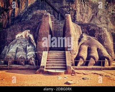 Vintage retro effect filtered hipster style image of famous Sri Lankan tourist landmark - lion's paws pathway on Sigiriya rock, Sri Lanka Stock Photo