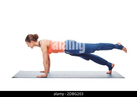 Woman yoga trainer doing a variation of Chaturanga Dandasana (four-limbed  staff) pose Stock Photo - Alamy