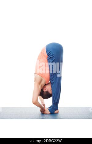 woman doing a toe stand, yoga pose Stock Photo - Alamy