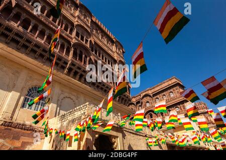 State flags of Jodhpur-Marwar in Meharngarh fort with blue sky. Jodhpur, Rajasthan, India Stock Photo