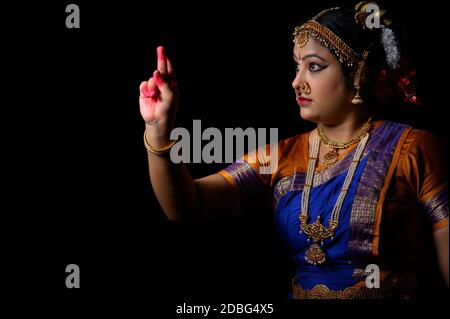 Kuchipudi dancer showing Raudra Rasa in her performance Stock Photo - Alamy