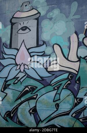 Wall paintings on the wall against sky and door with padlock Stock Photo