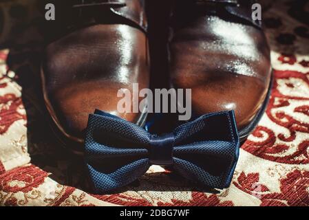 Businessman accessories. Men's Accessories : Men's bowtie, shoes and belt. Grooms Set Stock Photo