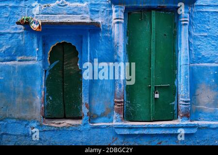 Blue house facade in streets of of Jodhpur, also known as 'Blue City' due to the vivid blue-painted Brahmin houses, Jodhpur, Rajasthan, India Stock Photo