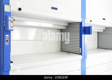 Automated Vertical Carousel Retrieval Storage Warehouse System Stock Photo