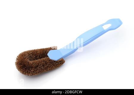 Coconut coir fiber scrubbing brush with handle on white background Stock Photo