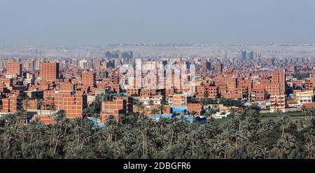 View of the panorama Cairo city skyline from Pyramids in the Giza Plateau, Egypt Stock Photo