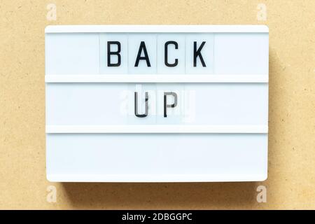 Lightbox with word back up on wood background Stock Photo