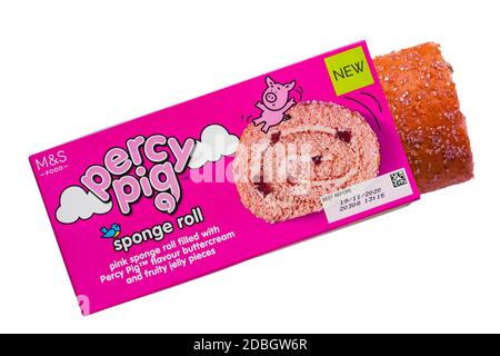 M&S Percy Pig sponge roll cake in box set on white background - pink sponge roll filled with Percy Pig flavour buttercream and fluffy jelly pieces Stock Photo