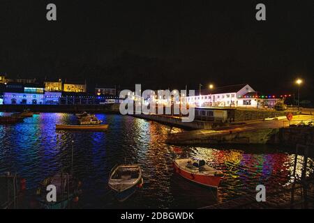 Porthleven Cornwall, Lovely night photos of Porthleven with fireworks at Christmas with colourful boats in the harbour Stock Photo