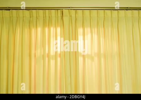 yellow curtain on home door texture and background Stock Photo