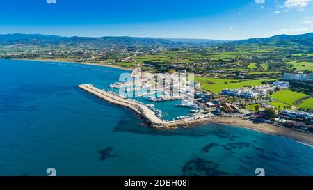 Aerial bird's eye view of Latchi port, Akamas peninsula, Polis Chrysochous, Paphos, Cyprus. The Latsi harbour with boats and yachts, fish restaurants, Stock Photo