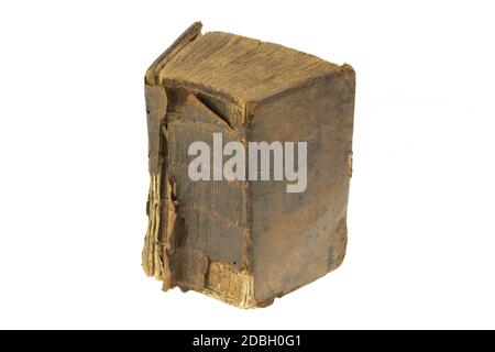 Books backgrounds. Close-up of a over 100 year old thick antique bible with tattered and torned cover isolated on a white background. Macro of ancient Stock Photo