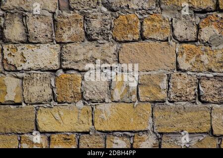 a shadow from the blocks of limestone shell. Wall texture background Stock Photo
