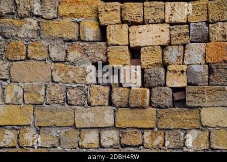a shadow from the blocks of limestone shell. Wall texture background Stock Photo