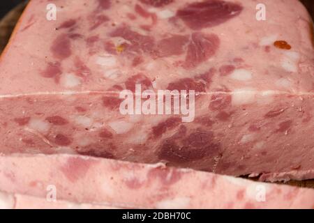 sliced boiled sausage with slices of whole meat, close up Stock Photo
