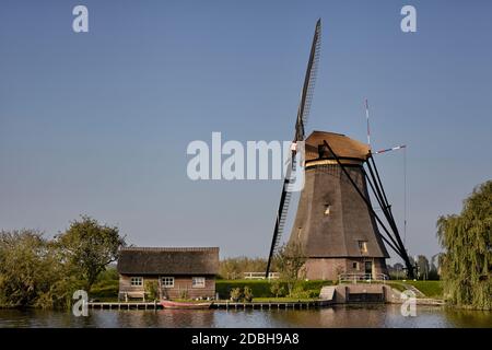 Netherlands rural lanscape with windmills at famous tourist site Kinderdijk in Holland Stock Photo