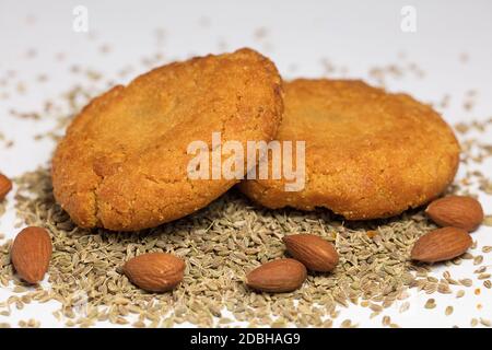 almonds (without shell) and sesame, homemade cookies, white backgrou Stock Photo