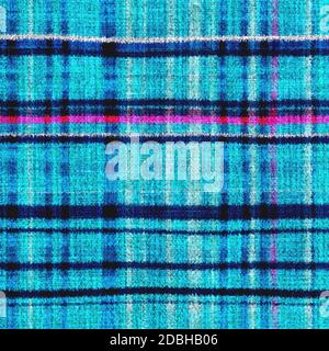 Variegated multicolor tapestry plaid woven texture. Space dyed watercolor effect knit check background. Fuzzy thin grungy textile material. Tufted Stock Photo